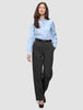 Eine Frau in einem hellblauen Hemd mit Knöpfen und einem schwarzen Gürtel trägt die Women GO2 Pants Straight Dark Grey Melange und präsentiert damit einen minimalistischen Look, der vom skandinavischen Design inspiriert ist.
