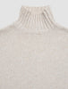 Damen-Rollkragenpullover aus weicher, grob gestrickter Wolle Sugar Melange – ein cremefarbener Rollkragenpullover aus Merinowolle in grober Strickoptik.