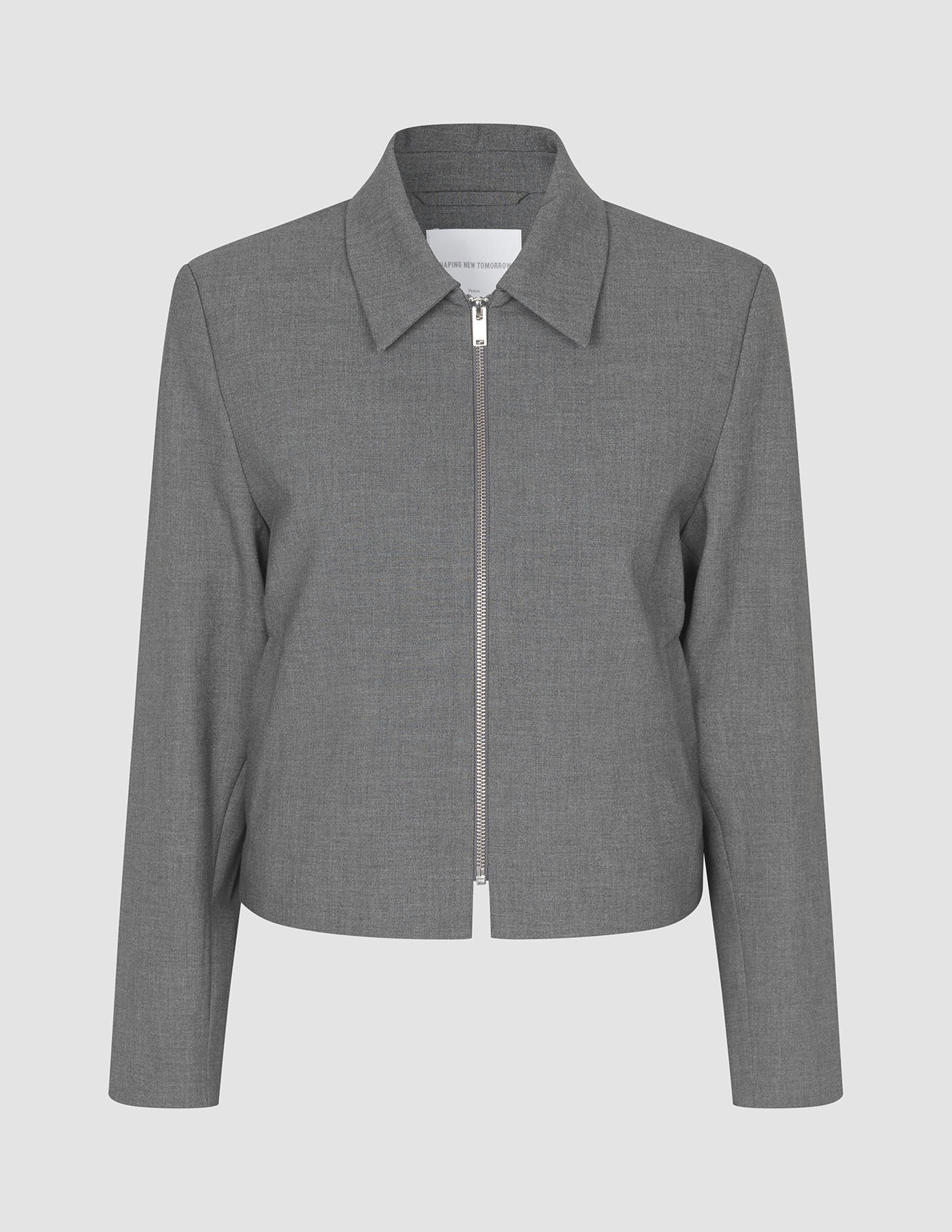 Essential Short Zip Jacket Dark Grey Melange: ein grauer Stretch-Blazer mit Reißverschluss vorne und spitzem Kragen.