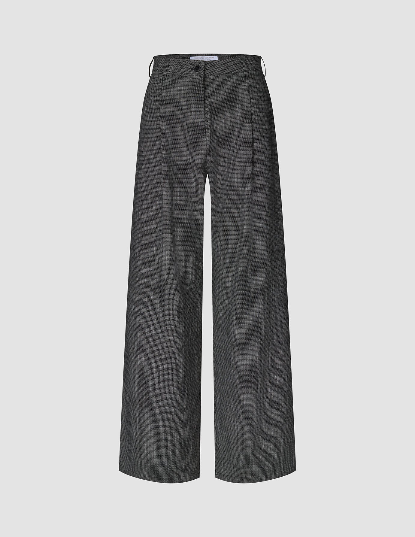 Damenhose Nara in weitem Schnitt mit schwarzem Karomuster, hoher Taille, Knopfleiste, Gürtelschlaufen und schwarz-weißem Karomuster.